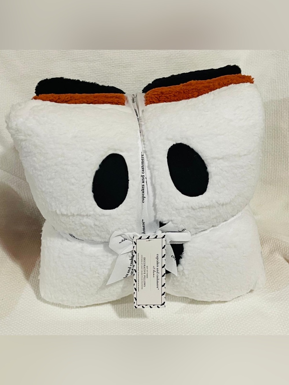 cupcakes & cashmere White Plush Throw with Black & Brown Accents